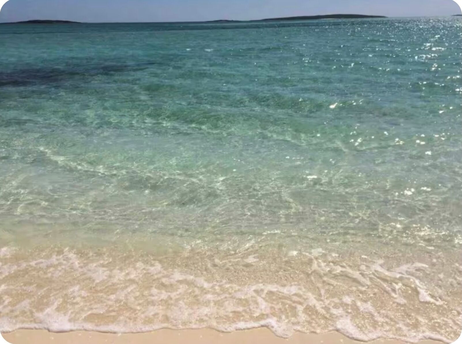 On the beach, sun loungers, beach towels