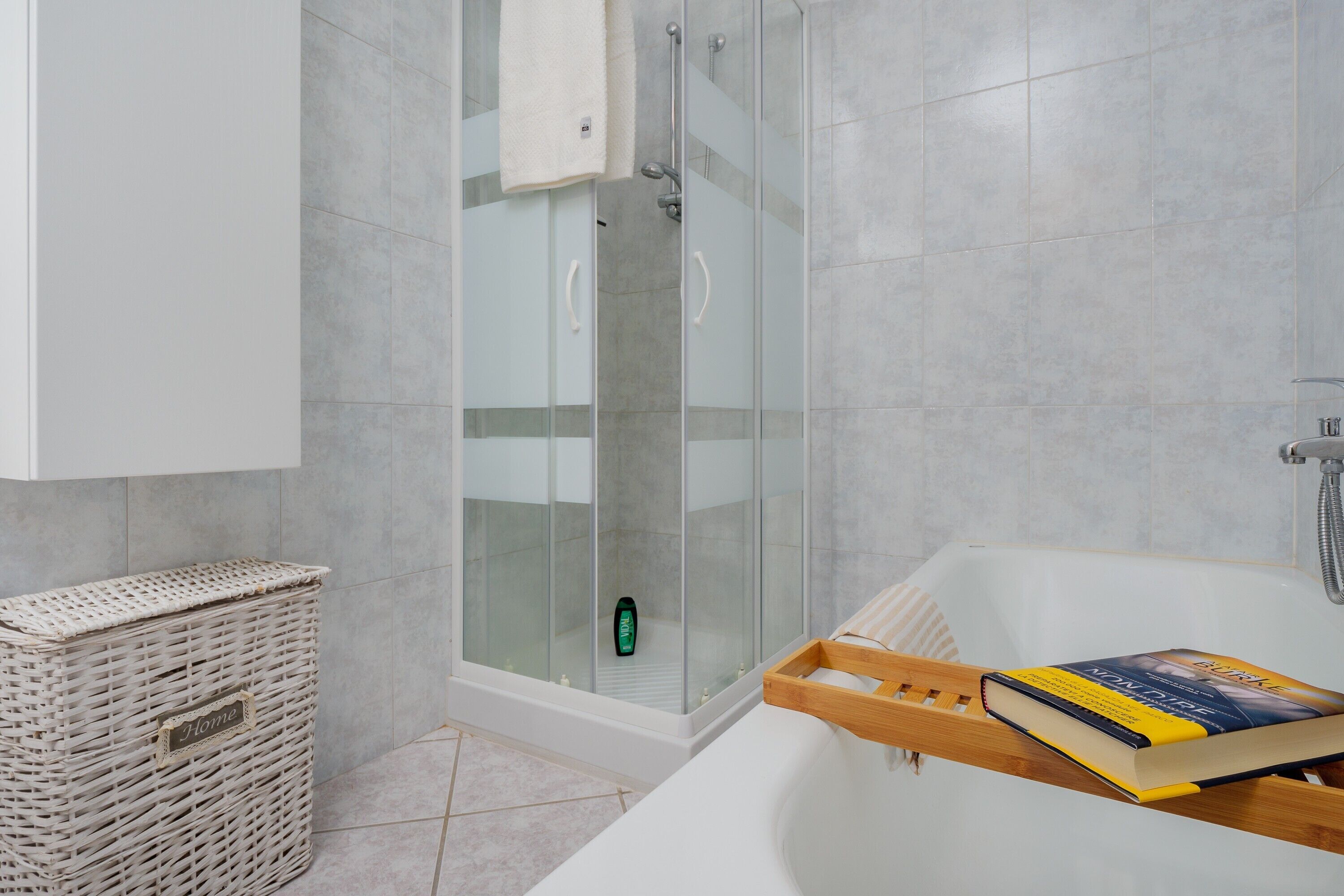 Bathtub, hair dryer, towels