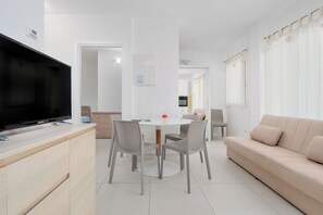 Living area - Holiday Home "Cormorani - Appartamento 3" Near the Beach with Sea View & Garden (golfo aranci)