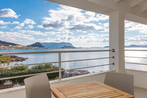 Outdoor dining - Apartment "Residenza Cormorani 2" Near the Beach with Sea View, Wi-Fi & Terrace (golfo aranci)