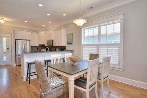 Dining - Discover Almost Heaven in Oak Island: a cozy 3-bedroom retreat with pool access. (Oak Island)