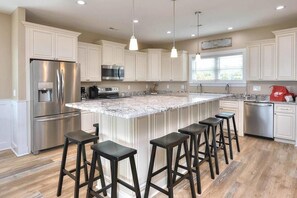 Fridge, microwave, oven, stovetop - Ocean Front-7BR/6.5BA Home-Elevated Pool-Elevator-Dog Friendly-Sleeps 24 (Oak Island)