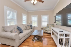 TV, DVD player - Experience beachfront bliss at Incommunicado, a spacious 4-bedroom home in Oak Island. (Oak Island)