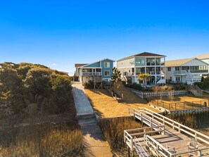 Exterior - Experience coastal charm at Lucky Enough, a spacious 4BR oceanview home in Oak Island. (Oak Island)