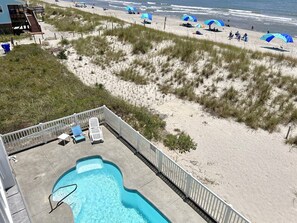 Pool - Experience oceanfront luxury at 'No Worries,' an ideal 5-bedroom retreat in Oak Island. (Oak Island)
