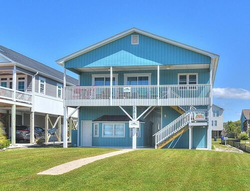 Experience coastal living at Ocean Breeze Retreat in Oak Island with ocean views.