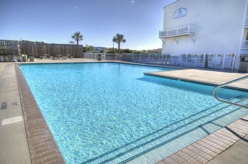 Experience ocean views at Oak Island OW 2204, a spacious 3-bedroom condo for 7.
