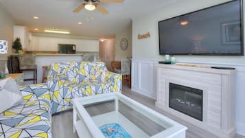 Televisión, chimenea y reproductor de DVD