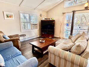 TV, DVD player - Reel Thrill: Cozy 3-bed retreat in Oak Island, perfect for family getaways! (Oak Island)