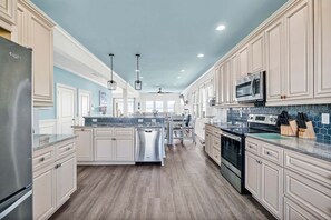 Fridge, microwave, oven, stovetop - Experience beachfront luxury with 7 bedrooms and a private pool. (Oak Island)