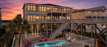 Oceanfront West Point in Oak Island: 12 bedrooms, sleeps 30, with luxury amenities.