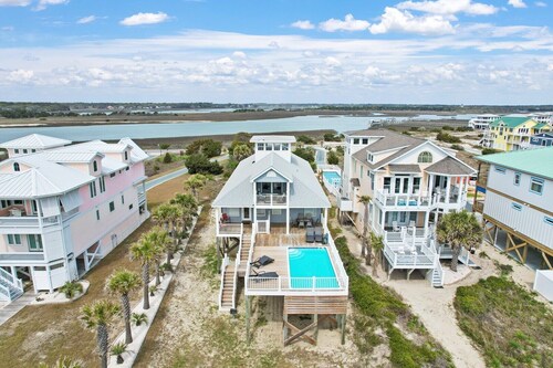 Experience oceanfront luxury at Yonder, Oak Island—7 bedrooms, pool, and breathtaking views!