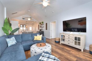 Smart TV, DVD player, table tennis, books - Experience ocean views at "Footprints in the Sand," a cozy 3BR retreat in Oak Island. (Oak Island)
