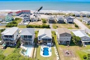 Exterior - Experience ocean views at "Footprints in the Sand," a cozy 3BR retreat in Oak Island. (Oak Island)