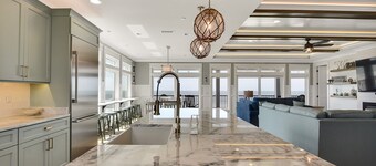 Experience luxury at Saltwater Gospel, a stunning 13-bedroom oceanfront retreat in Oak Island!