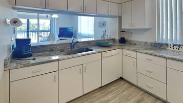 Condo, Multiple Beds, Balcony (Ocean Harbor 104A - No Pets Allowed) | Private kitchen | Fridge, microwave, oven, stovetop