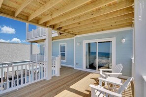 Terrace/patio - Oceanfront retreat in Oak Island with 7 bedrooms and pool for 20 guests. (Oak Island)