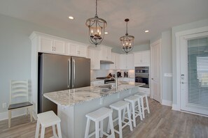 Fridge, microwave, oven, stovetop - Experience oceanfront luxury at AfterDune Delight, Oak Island's ideal getaway for 20 guests. (Oak Island)