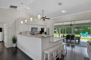 Fridge, microwave, oven, stovetop - Trendy half of a duplex near the beach with private pool and spa (Bonita Springs)