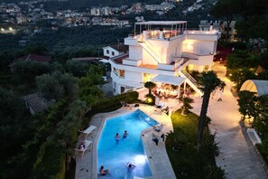 A heated pool, pool loungers