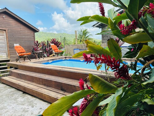 Aly's Valley Cabin, a private cabin in a village with a mountain view.