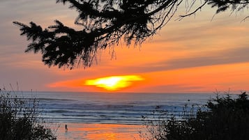 On the beach, sun-loungers, beach towels