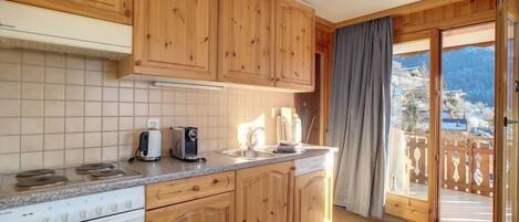 Fridge, oven, dishwasher, high chair