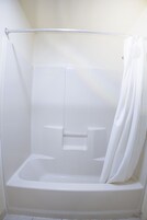 Room, 1 King Bed, Non Smoking | Bathroom | Separate tub and shower, free toiletries, hair dryer, towels