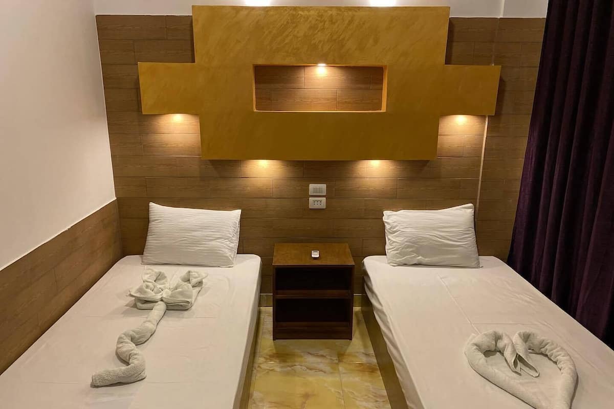 Chambre Double ou avec lits jumeaux | Wi-Fi gratuit