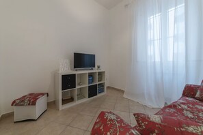 1 habitación, tabla de planchar con plancha y wifi