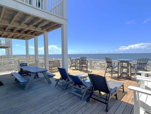 Outdoor dining - Luxurious oceanfront retreat in Oak Island, perfect for 24 guests! (Oak Island)