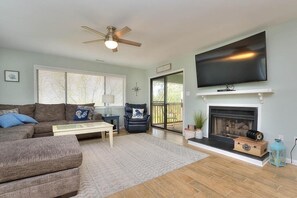 TV, DVD player - Point Break: A cozy 3-bedroom condo in beautiful Caswell Beach, Oak Island. (Oak Island)