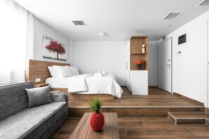 Estudio Deluxe, cocina | Zona de estar | Una televisión de pantalla plana