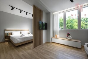 Phòng Suite Deluxe, bếp | Phòng cách âm, truy cập Internet không dây miễn phí 
