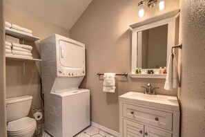 Combined shower/bathtub, hair dryer