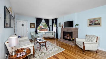 Smart TV, fireplace, books