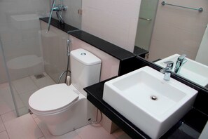 Shower, bidet, towels, soap