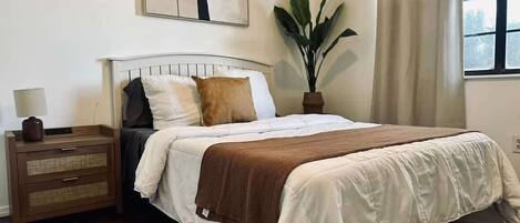 4 habitaciones, tabla de planchar con plancha, wifi y ropa de cama