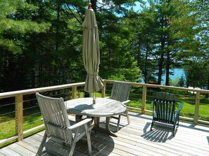 Outdoor dining - Badgers Camp - Beautiful and spacious home on Dodge Pond (Rangeley)