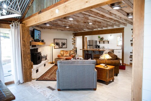 House on the lake with a large sandy beach just steps from the back door.