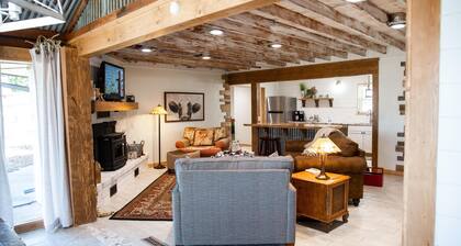 House on the lake with a large sandy beach just steps from the back door.