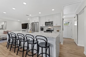 Fridge, microwave, oven, stovetop - Charming Coastal 2BR Villa, GOLF CART, Cozy Sunroom, Near Beach, Pool, Wharf. (Miramar Beach)