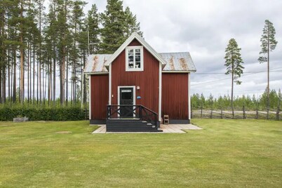 Två hus på ett vackert läge