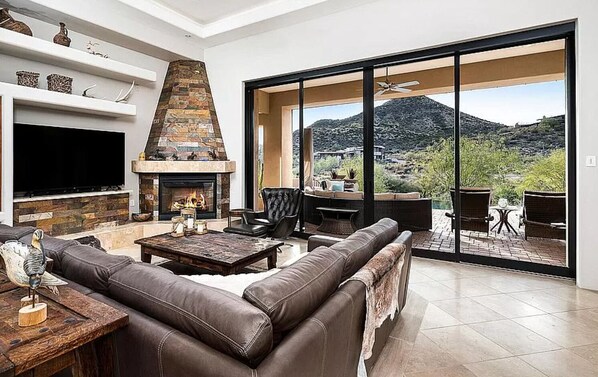 Smart TV, fireplace, books