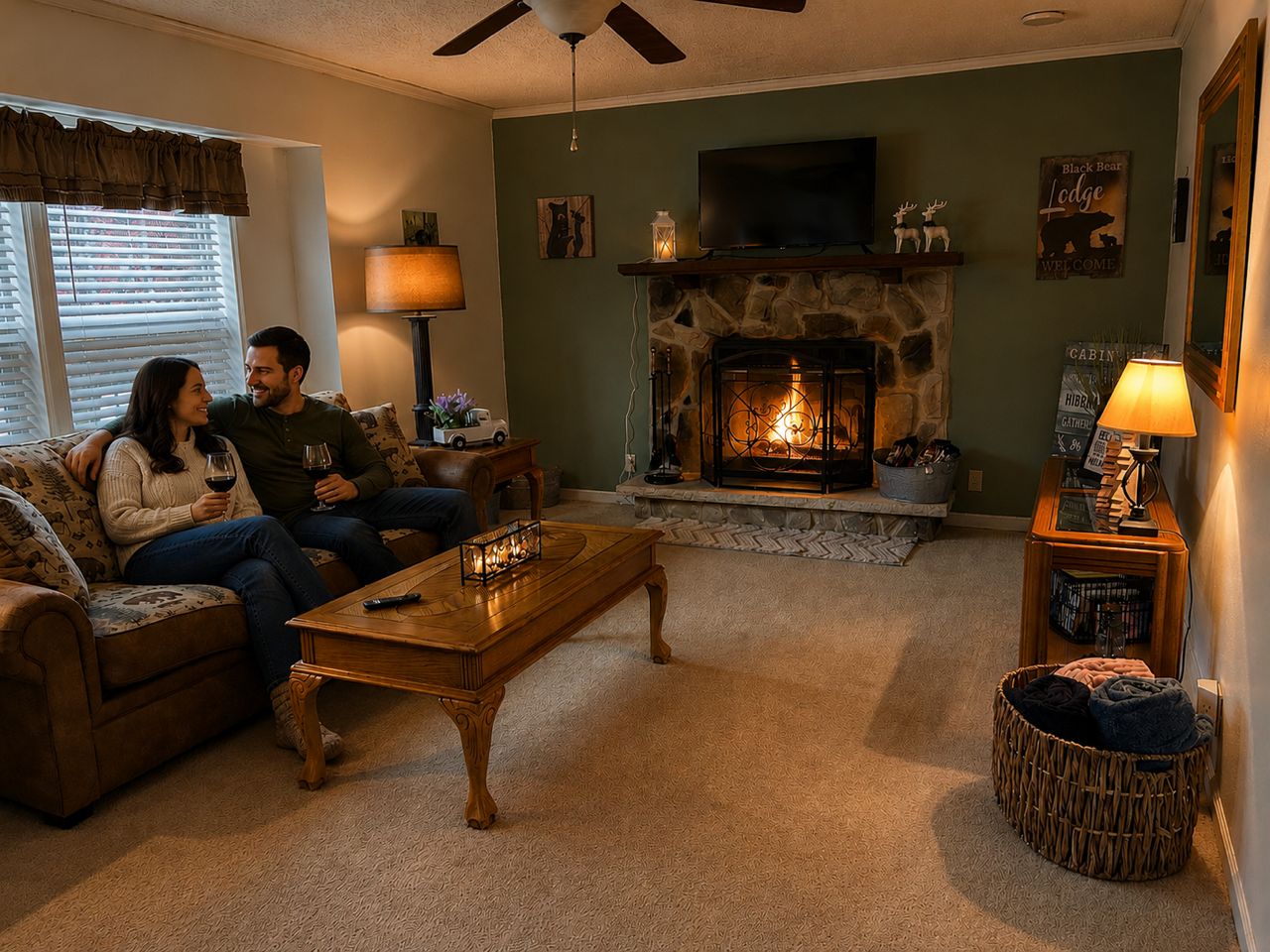 A cozy living room with a fireplace, a sofa, a coffee table, and a television.