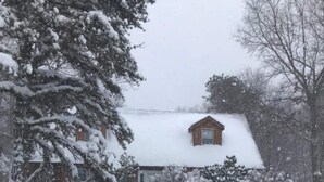A snow-covered residential area with a house and a driveway. - Beach, lake & pool within walking distance! Outdoor fire pit area, Game room (Albrightsville)