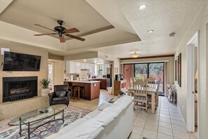 Smart TV, fireplace, books