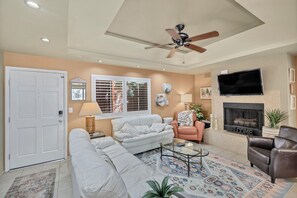 Smart TV, fireplace, books