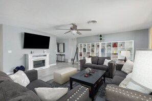 Smart TV, fireplace, books