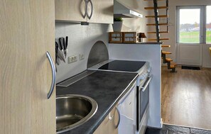 Fridge, stovetop, coffee/tea maker